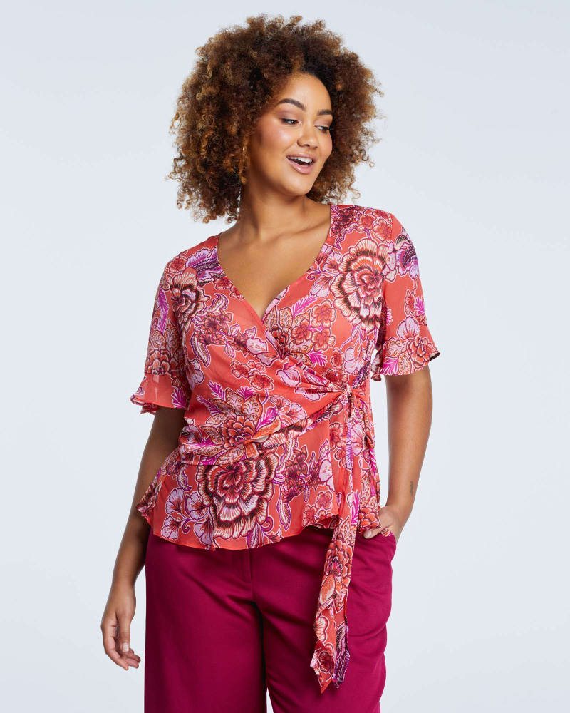 Front of a model wearing a size 3X Morris Floral Top in Print by Estelle. | dia_product_style_image_id:264615